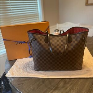 Louis Vuitton Gm Damier Ebene Neverfull with Brown Exterior and Red Interior.
